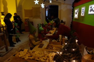 Kids working in the Carpenters Workshop of Santa Claus with Marco